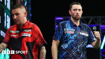 Luke Humphries celebrates win over Nathan Aspinall at Grand Slam of Darts