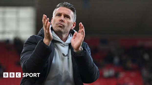 Rob Edwards claps the fans at Middlesbrough