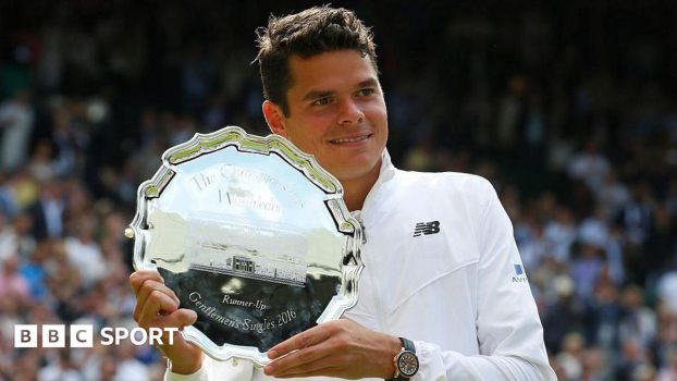 Milos Raonic hols the 2016 Wimbledon runners-up plate