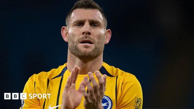 James Milner applauds supporters after a football match
