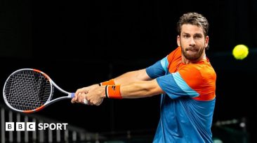 Cameron Norrie prepares to play a backhand
