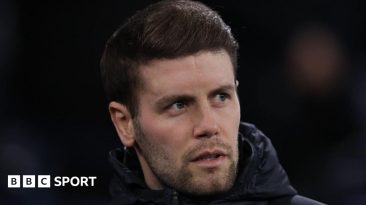 Brighton boss Fabian Hurzeler watches a game from the sidelines