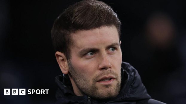 Brighton boss Fabian Hurzeler watches a game from the sidelines