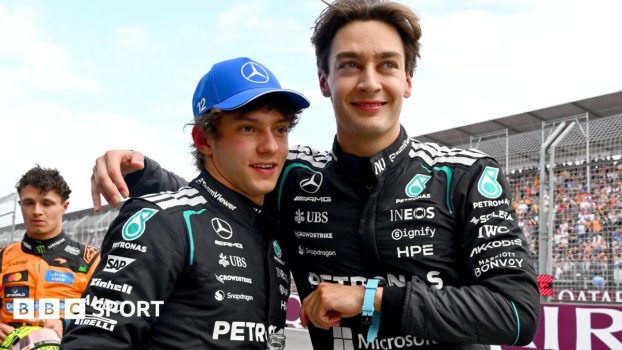 A smiling George Russell puts his arm around Mercedes' team-mate Kimi Antonelli's shoulder after they qualified on the front row for the Australian Grand Prix. To the left of the picture, McLaren's Lando Norris is looking glum
