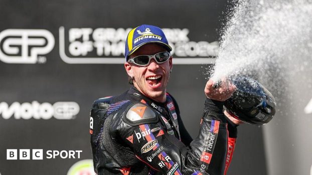 Marco Bezzecchi celebrates winning the opening race of the MotoGP season in Tokyo