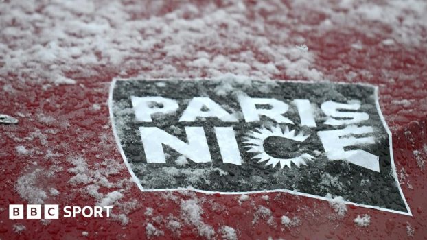 The Paris-Nice sign covered in snow
