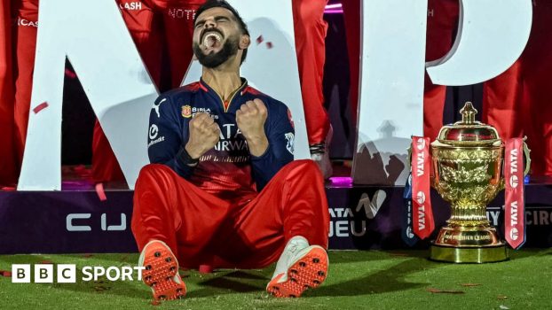 An England player behind a question mark