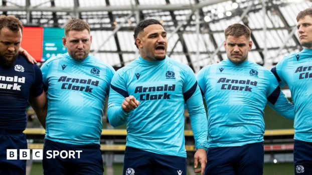 Scotland captain Sione Tuipulotu gives a talk to his team in Dublin