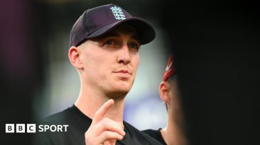 Harry Brook talks to his team