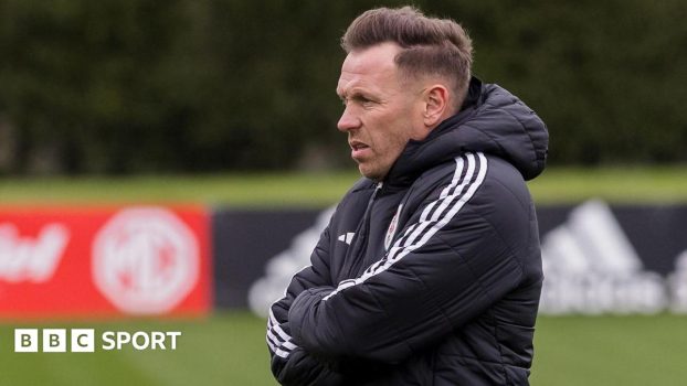 Craig Bellamy watches on during Wales training