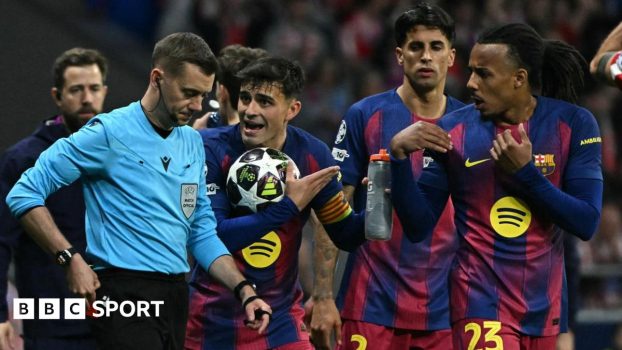 Barcelona players with referee Clement Turpin during the second leg of their Champions League quarter-final against Atletico Madrid