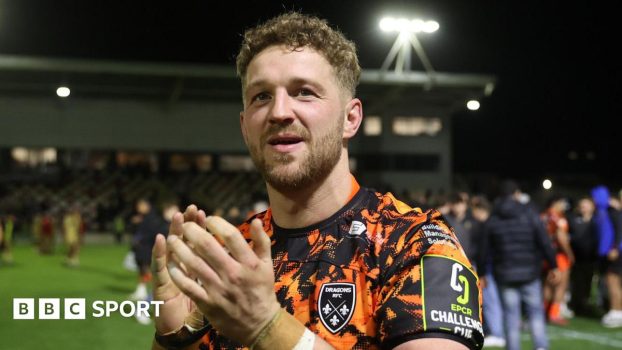 Angus O'Brien applauds the Dragons supporters after the win against Lyon in Newport