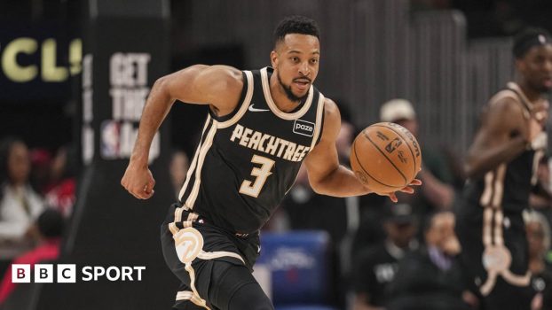 Atlantic Hawks' CJ McCollum dribbles the basketball