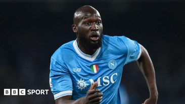 Romelu Lukaku running in a light blue Napoli shirt