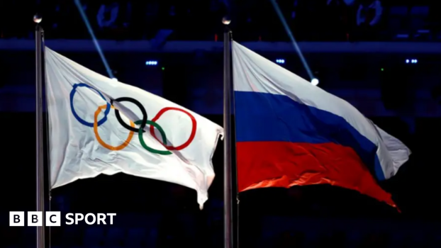 The flag of the International Olympic Committee and the flag of the Russia national flag