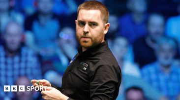 Welshman Jak Jones chalks his cue