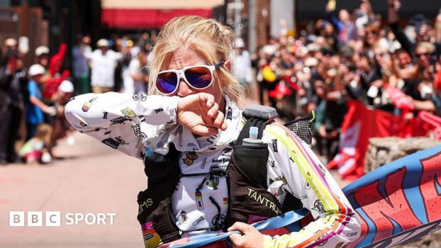 Rachel Entrekin looks emotional at the finish line of the Cocodona 250 ultramarathon