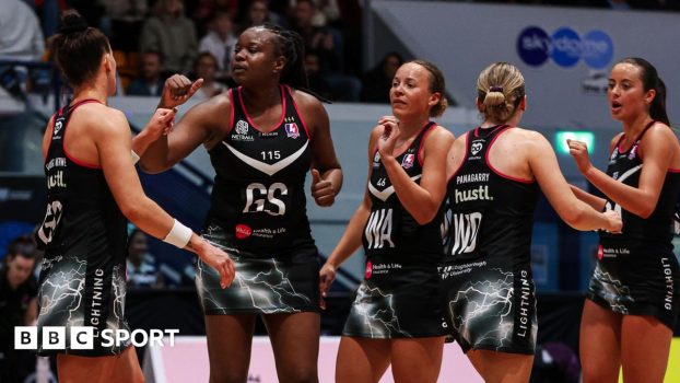 Five Loughborough Lightning players celebrate together